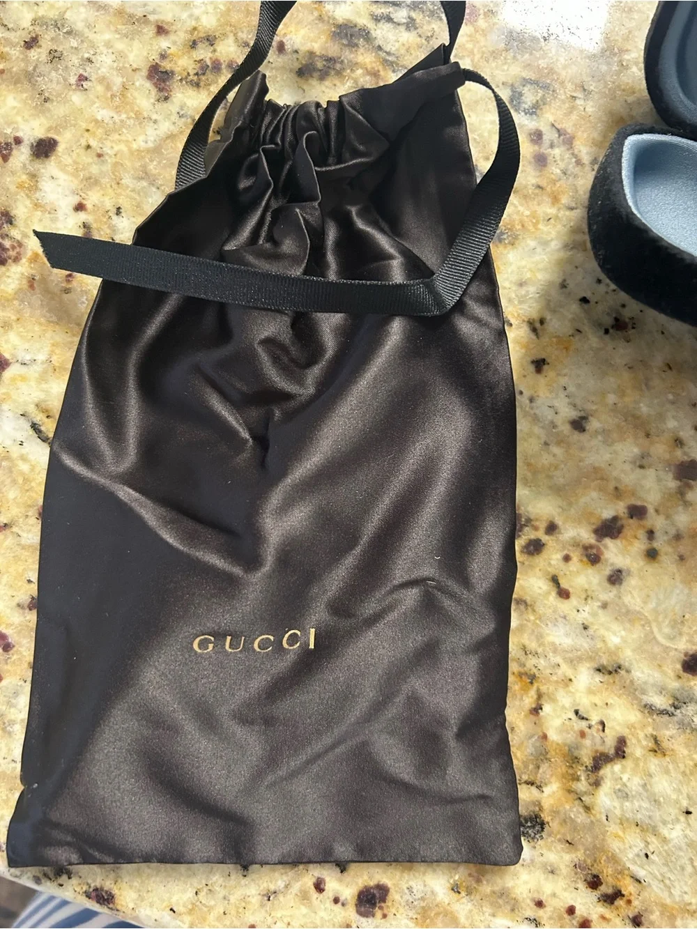 Gucci Men’s Black Frame Sunglasses with Dark Lenses